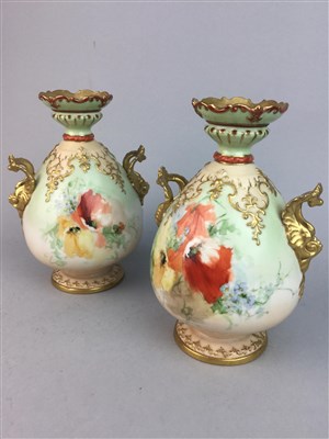 Lot 162 - A PAIR OF POSSIL POTTERY NAUTILUS VASES