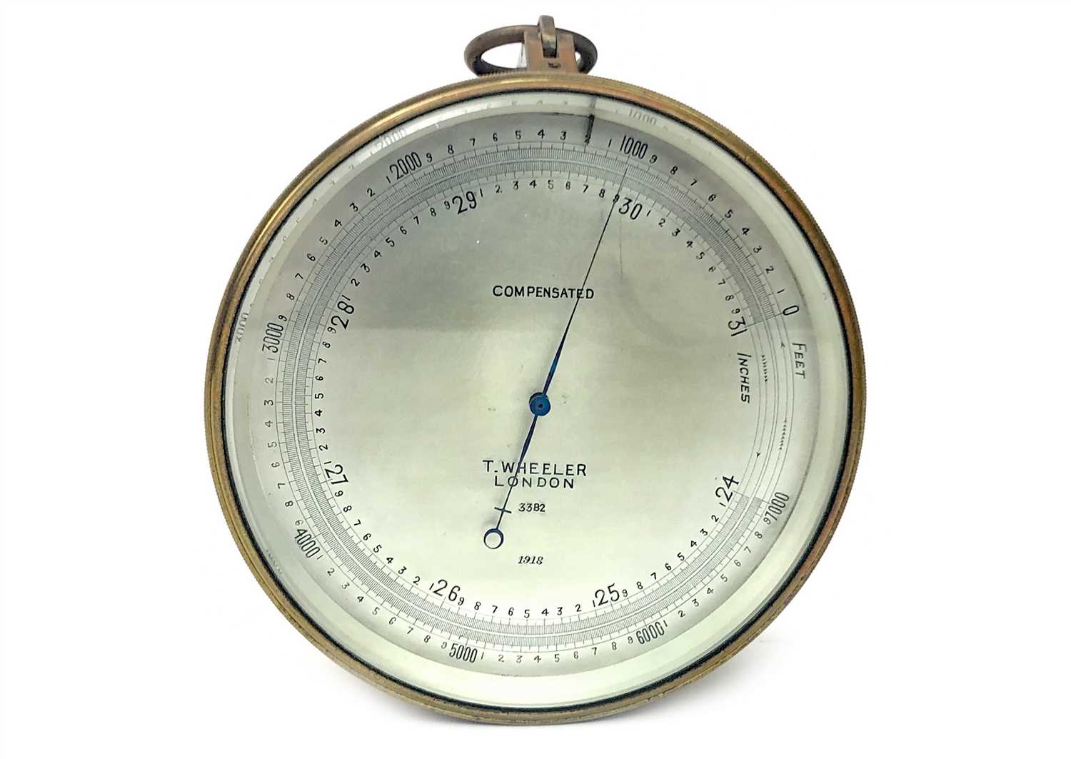 Lot 1444 - A BRASS CASED ANEROID BAROMETER BY T. WHEELER