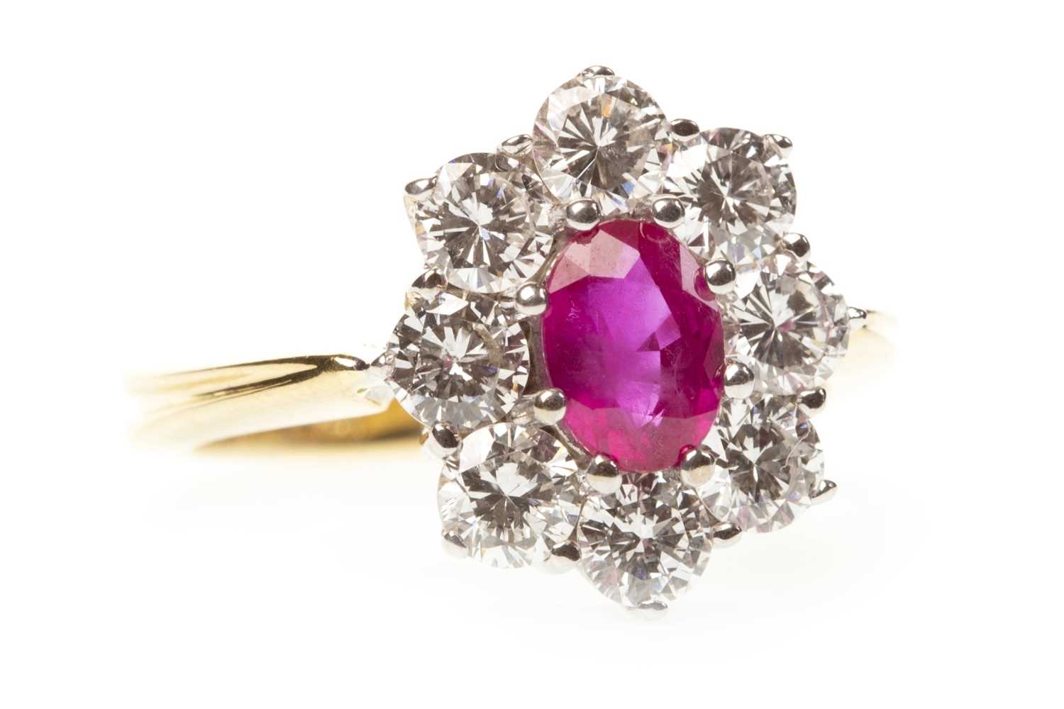 Lot 4 - A RUBY AND DIAMOND CLUSTER RING
