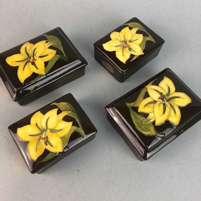 Lot 427 FOUR MODERN MOORCROFT RECTANGULAR PIN DISHES