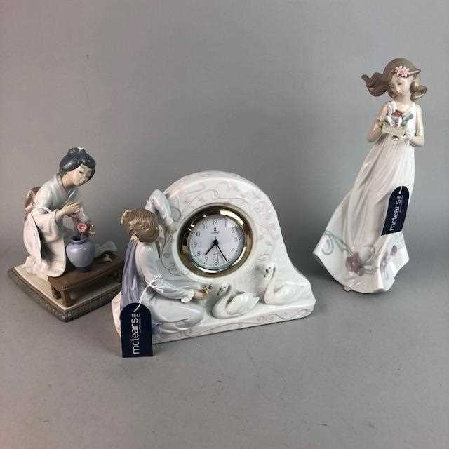 Lot 455 - A LLADRO MANTEL CLOCK AND TWO LLADRO FIGURES