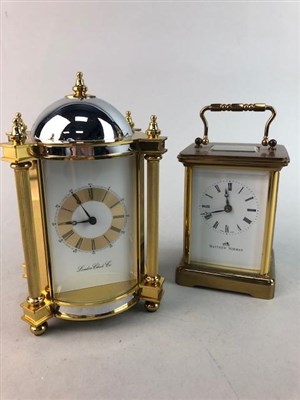 Lot 466 - A MATTHEW NORMAN CARRIAGE CLOCK, ANOTHER CARRIAGE CLOCK AND TWO MANTEL CLOCKS