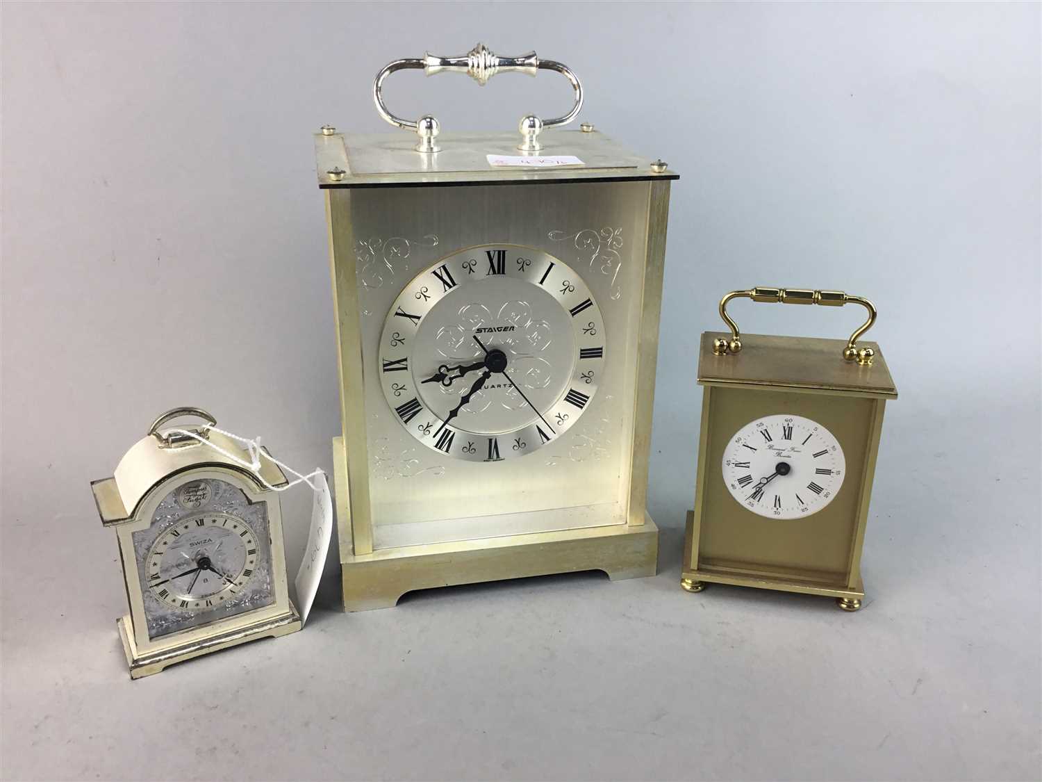 Lot 470 - A STAIGER QUARTZ CARRIAGE CLOCK, TWO OTHER CARRIAGE CLOCKS AND THREE MANTEL CLOCKS