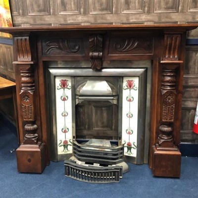 Lot 489 - A CAST IRON AND CERAMIC TILED FIRE PLACE WITH STAINED WOOD SURROUND