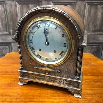 Lot 503 - AN OAK CASED MANTEL CLOCK