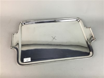 Lot 493 - A RECTANGULAR TWIN HANDLED SILVER PLATED SERVING TRAY