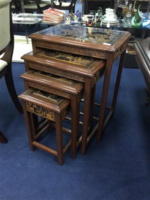 Lot 517 - A CHINESE HARDWOOD NEST OF FOUR TABLES