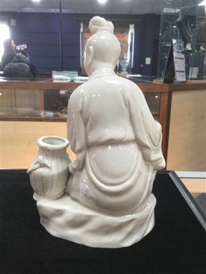 Lot 331 - A 20TH CENTURY CHINESE BLANC DE CHINE FIGURE OF A MAN