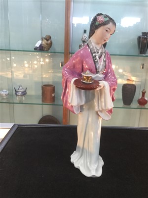 Lot 1087 - A LOT OF THREE CHINESE CERAMIC FIGURES