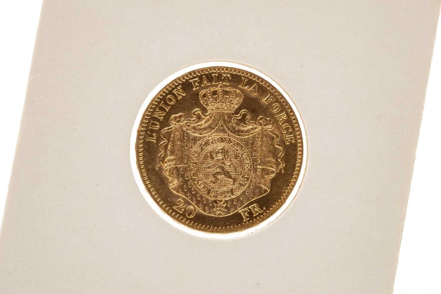 Lot 585 - A GOLD BELGIAN 20 FRANC COIN, 1869