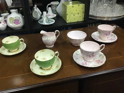 Lot 385 - TWO FLORAL AND GILT TEA SERVICES AND A COFFEE SERVICE