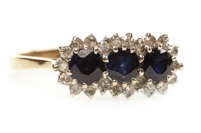 Lot 206 - A BLUE GEM SET AND DIAMOND CLUSTER RING