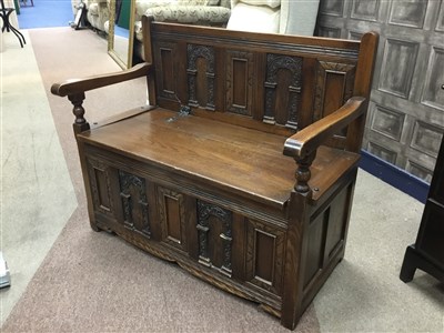 Lot 533 - AN OAK MONKS BENCH