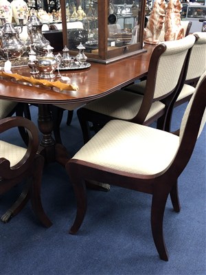 Lot 506 - A MAHOGANY DINING SUITE