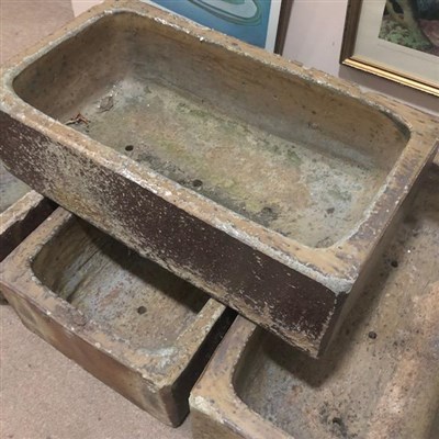 Lot 270 - A LOT OF FOUR CLAY TROUGHS