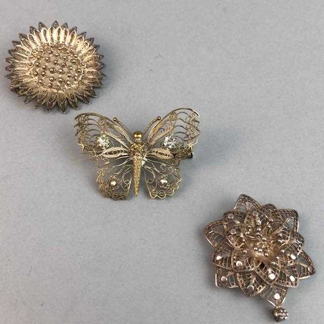 Lot 62 - A LOT OF NINE SILVER FILIGREE BROOCHES
