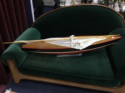 Lot 76 - A LARGE WOODEN MODEL OF A YACHT