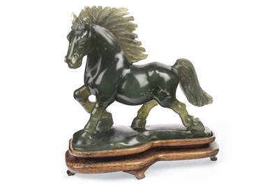 Lot 1088 - A CHINESE FIGURE OF A GALLOPING HORSE