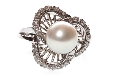 Lot 16 - A PEARL AND DIAMOND RING