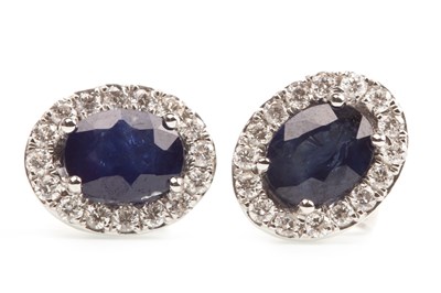 Lot 215 - A PAIR OF SAPPHIRE AND DIAMOND EARRINGS