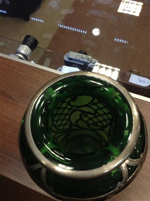 Lot 1261 - AN ART NOUVEAU SILVER OVERLAID GREEN GLASS VASE