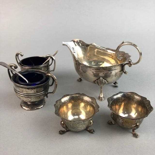 Lot 179 - A SILVER SAUCE BOAT AND TWO PAIRS OF SILVER SALT CELLARS