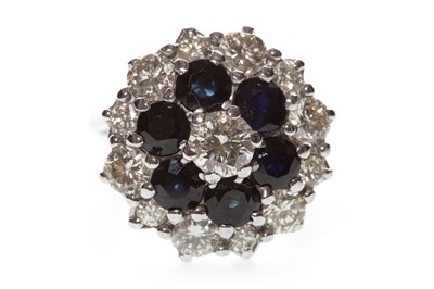 Lot 34 - A BLUE GEM AND DIAMOND CLUSTER RING