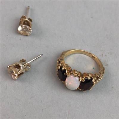 Lot 200 - AN OPAL AND GARNET DRESS RING AND A PAIR OF EAR STUDS