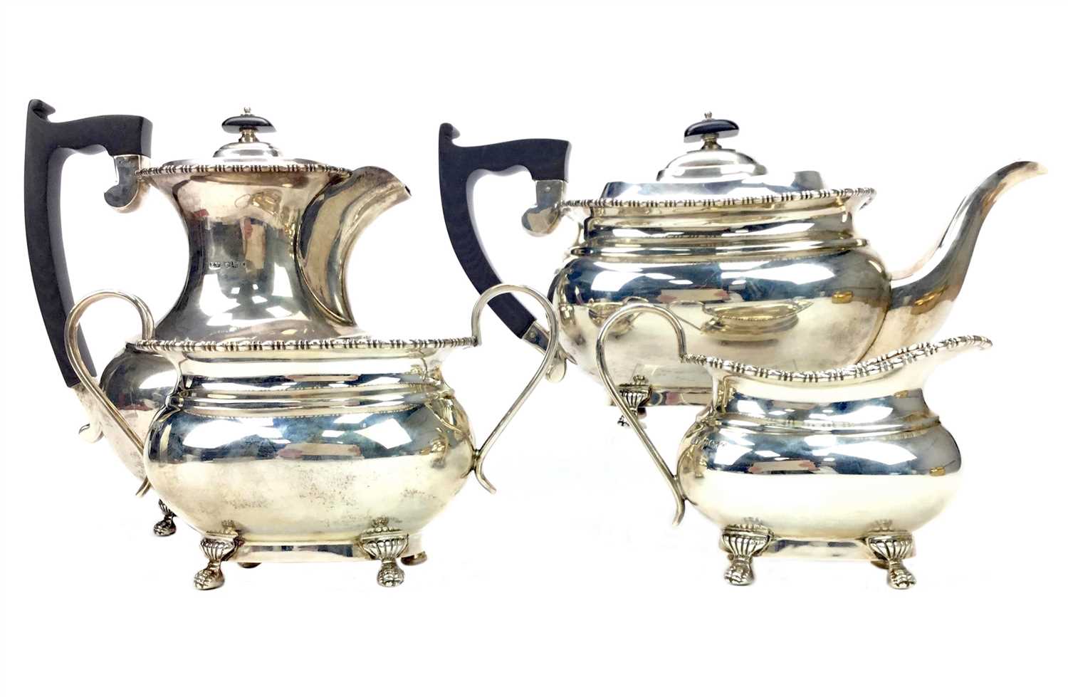 Lot 868 - A SILVER FOUR PIECE TEA AND COFFEE SERVICE