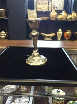 Lot 874 - A PAIR OF GEORGE V SILVER CANDLESTICKS