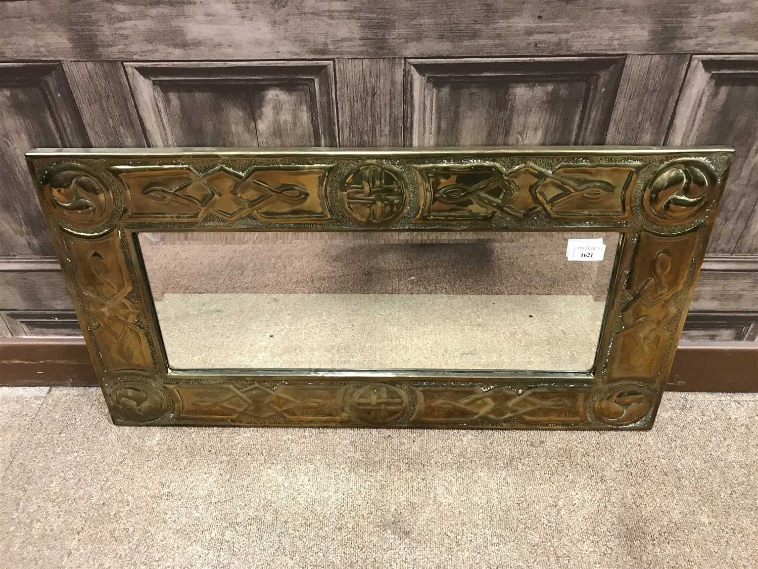 Lot 1621 - A BEVELLED WALL MIRROR