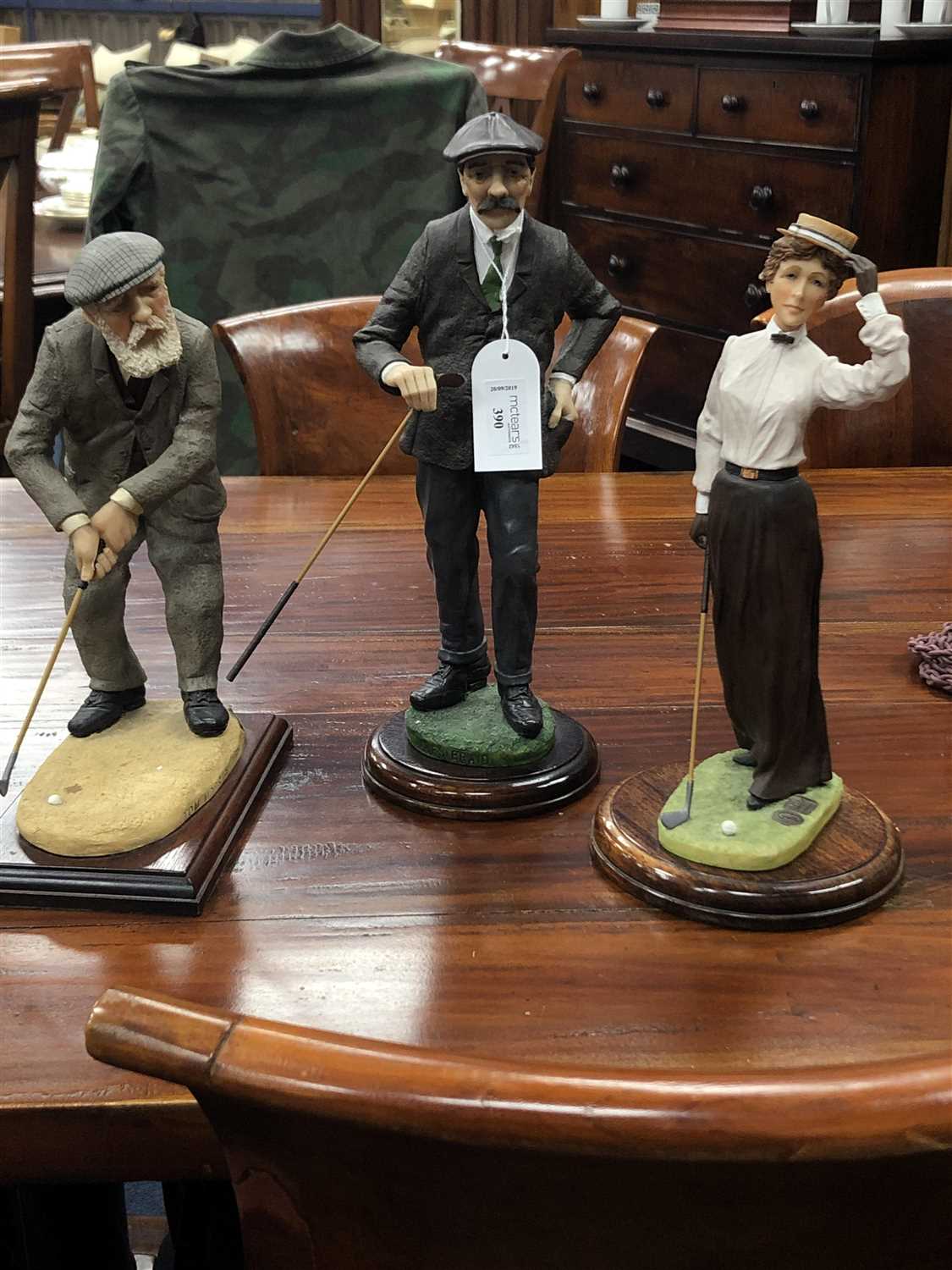 Lot 390 - A LOT OF THREE GOLFING FIGURES