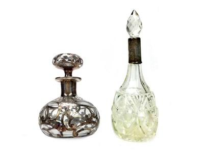 Lot 879 - A LOT OF TWO SILVER OVERLAID PERFUME BOTTLES