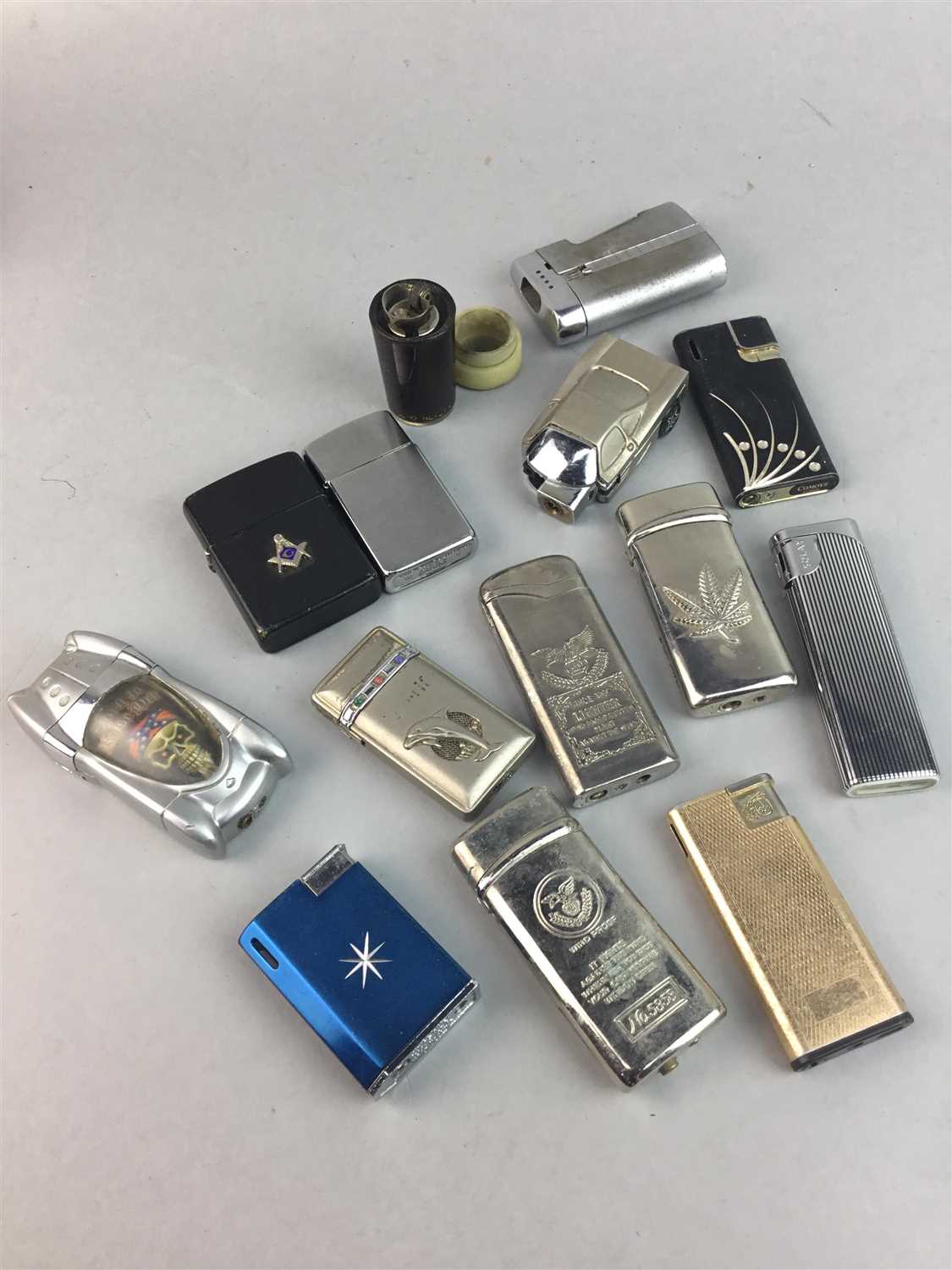 Lot 523 - A COLLECTION OF ZIPPO AND OTHER LIGHTERS