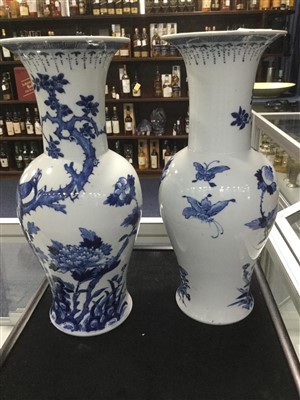 Lot 1104 - A PAIR OF 20TH CENTURY CHINESE BLUE AND WHITE VASES
