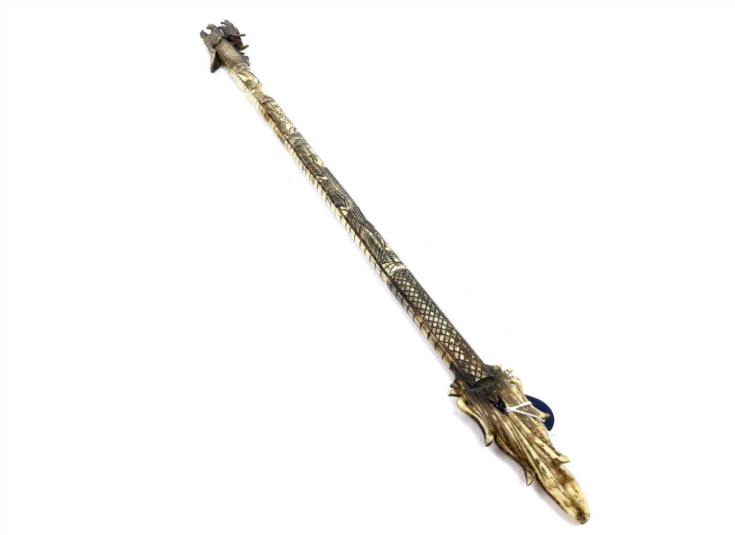 Lot 1105 - A CHINESE CARVED BONE SCEPTRE