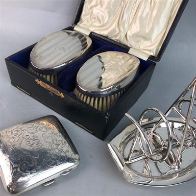 Lot 128 - A PAIR OF SILVER BACKED BRUSHES, A SILVER CIGARETTE CASE AND A TOAST RACK