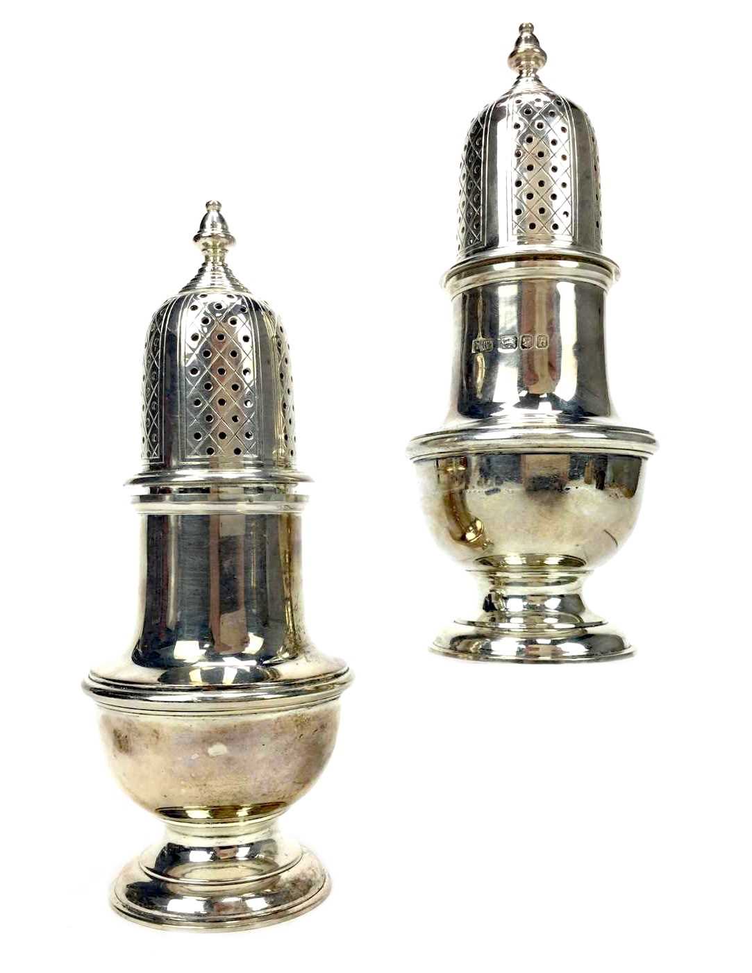 Lot 900 - A PAIR OF SILVER SUGAR CASTERS