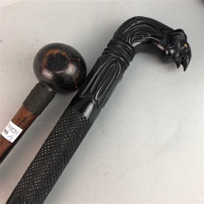 Lot 593 - AN AFRICAN KNOBKERRY AND AN EBONY WALKING STICK