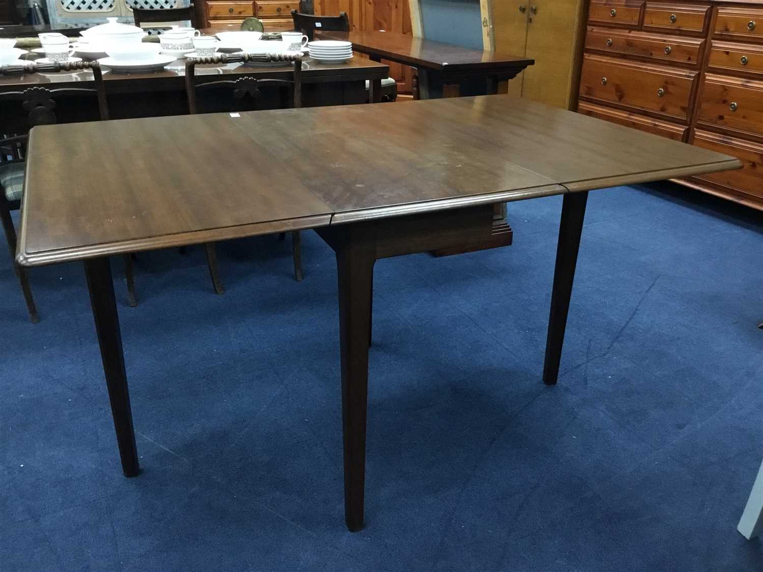Lot 217 - A DROP LEAF DINING TABLE AND FOUR CHAIRS