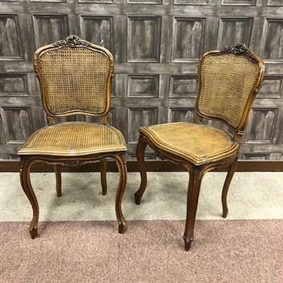Lot 1674 - A SET OF SIX FRENCH WALNUT CANED SINGLE CHAIRS