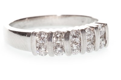 Lot 62 - A DIAMOND DRESS RING