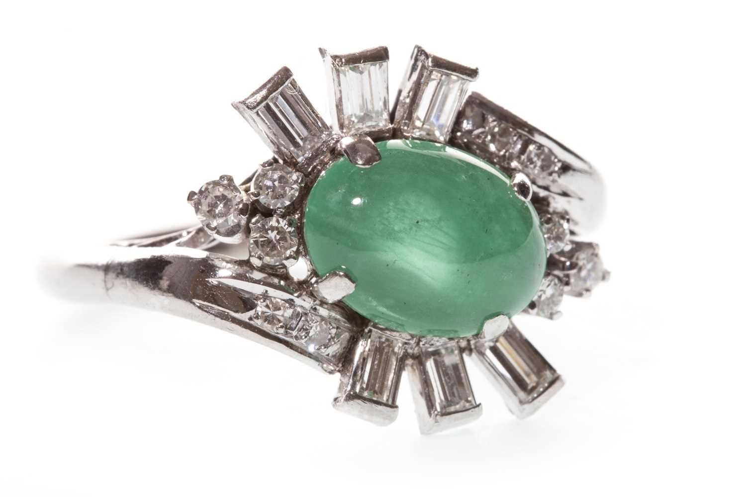 Lot 74 - A GREEN GEM AND DIAMOND RING