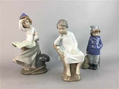 Lot 50 - A LLADRO FIGURE AND TWO NAO FIGURES