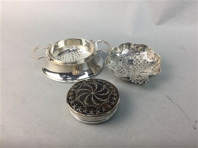 Lot 29 - A LOT OF TWO SILVER TEA STRAINERS