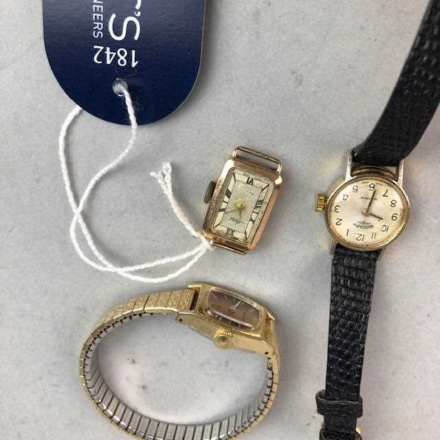 Lot 12 - A LADY'S AVIA GOLD WATCH, A ROTARY WATCH AND A SEIKO WATCH