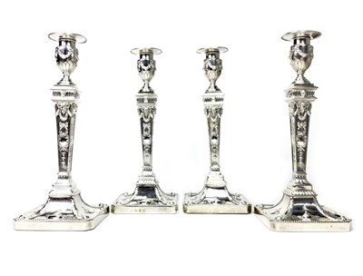 Lot 936 - AN IMPRESSIVE SET OF FOUR GEORGE III SILVER CANDLESTICKS