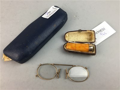 Lot 94 - A PAIR OF GOLD PLATED PINCE NEZ WITH A CHEROOT