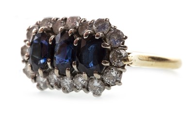 Lot 157 - A BLUE GEM AND DIAMOND CLUSTER RING