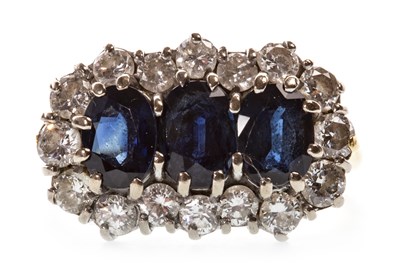 Lot 157 - A BLUE GEM AND DIAMOND CLUSTER RING